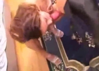 Cute chick sucked her doggy's massive boner