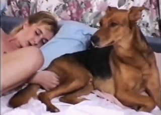 Curvy lady fucks herself, seduces brown dog